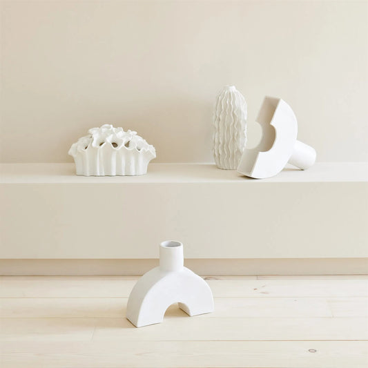Sea Ribbons Vase by Global Views in matte white. Made from unique in a coastal style.
