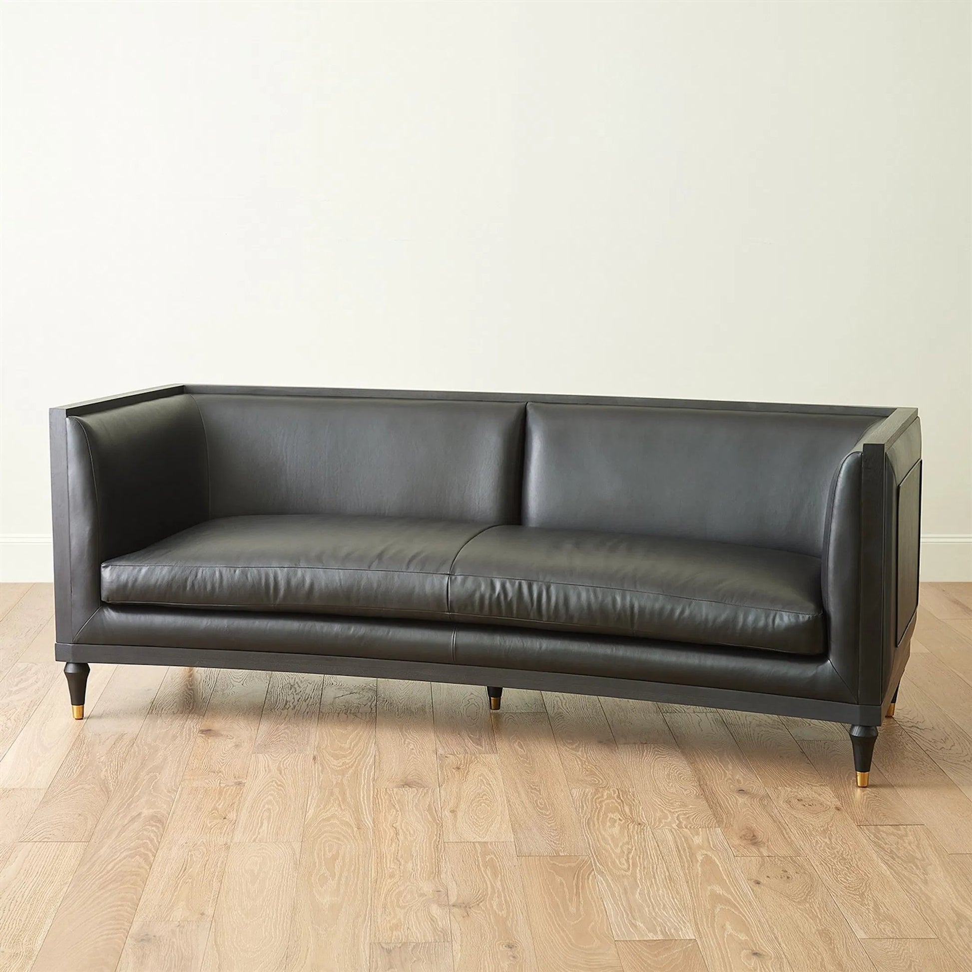 Arc Sofa by Global Views in black and brass. Made from unique in a traditional style.