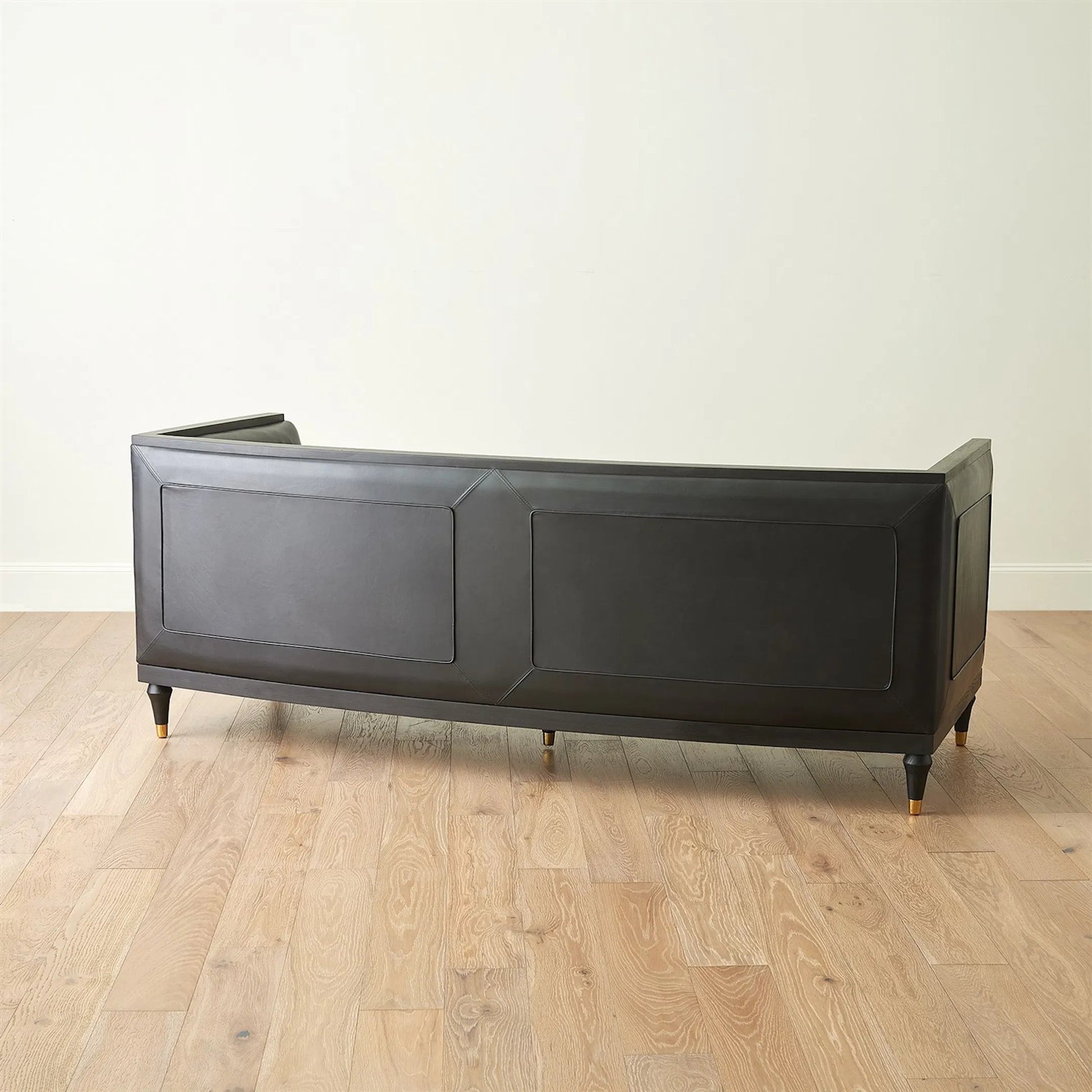 Arc Sofa by Global Views in black and brass. Made from unique in a traditional style.