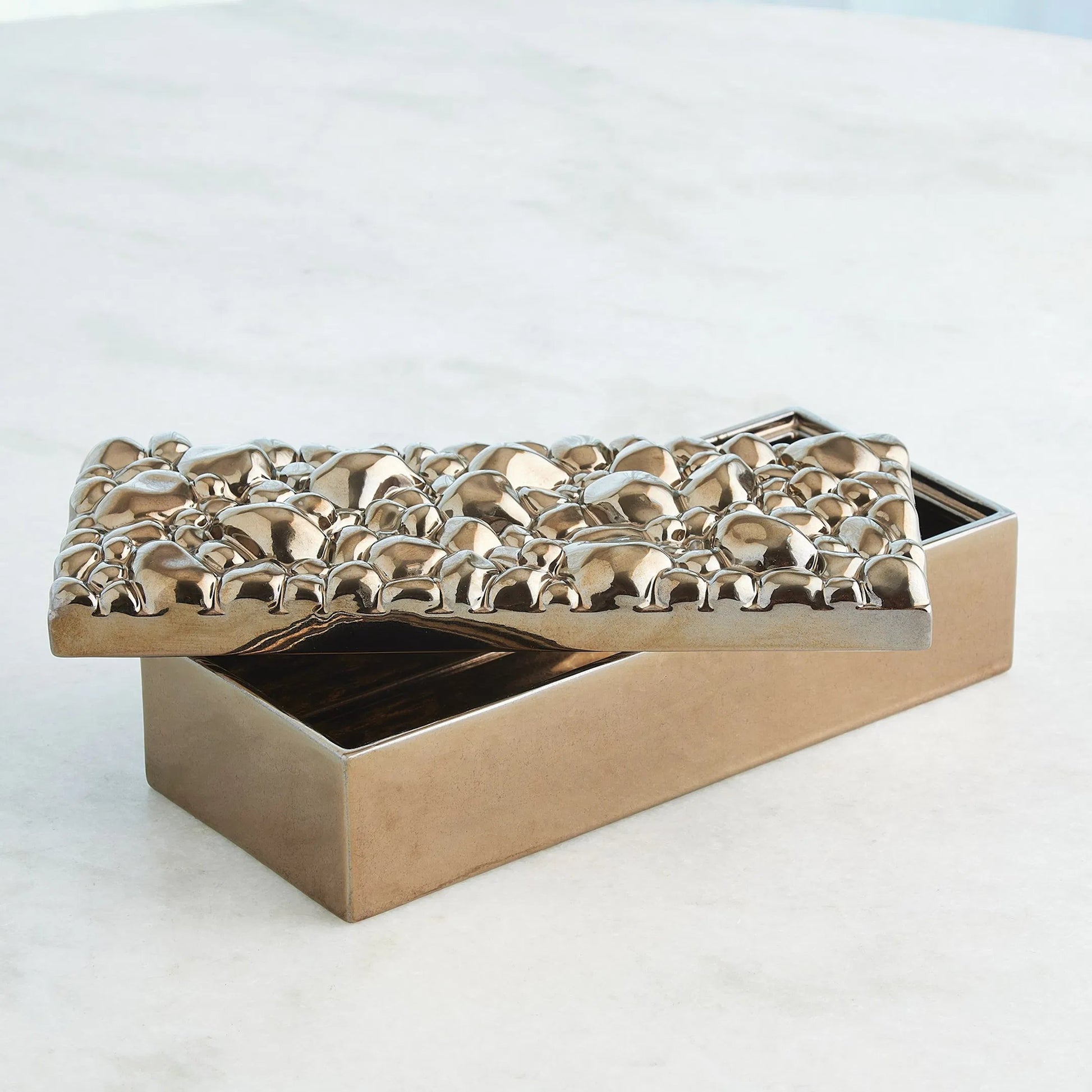 Pebbles Rectangular Box by Global Views in bronze. Made from ceramic in a modern style.