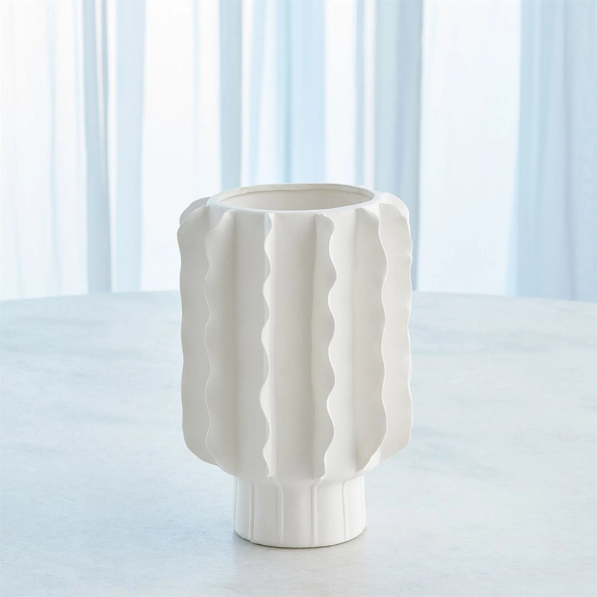 Frilled Bowl by Global Views in white and matte white. Made from unique in a modern style.