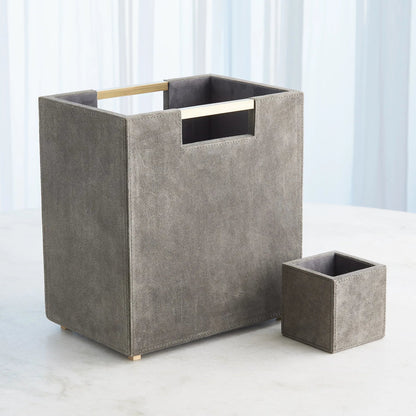 Posh Wastebasket by Global Views. Made from mdf, cloth polysuede, brass in a unique style.