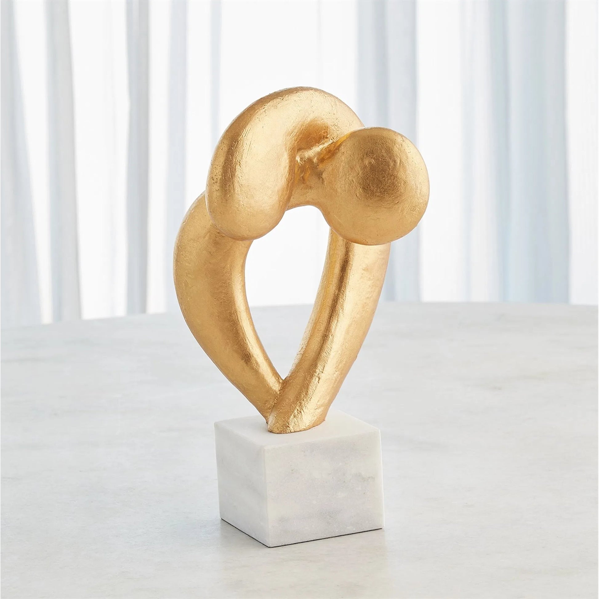 Align Sculpture by Global Views. Made from cast iron, marble in a modern style.