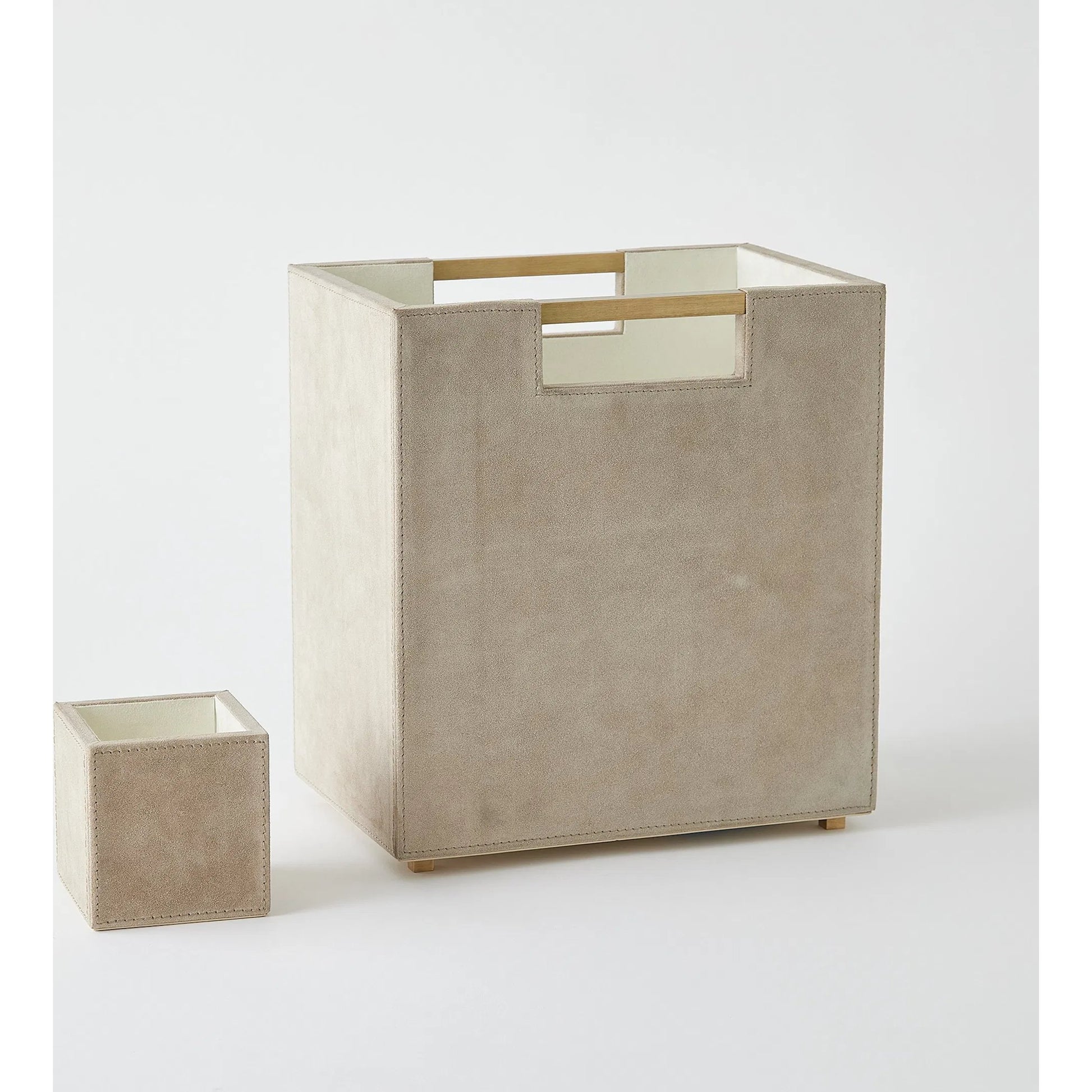 Posh Wastebasket by Global Views. Made from mdf, cloth polysuede, brass in a unique style.