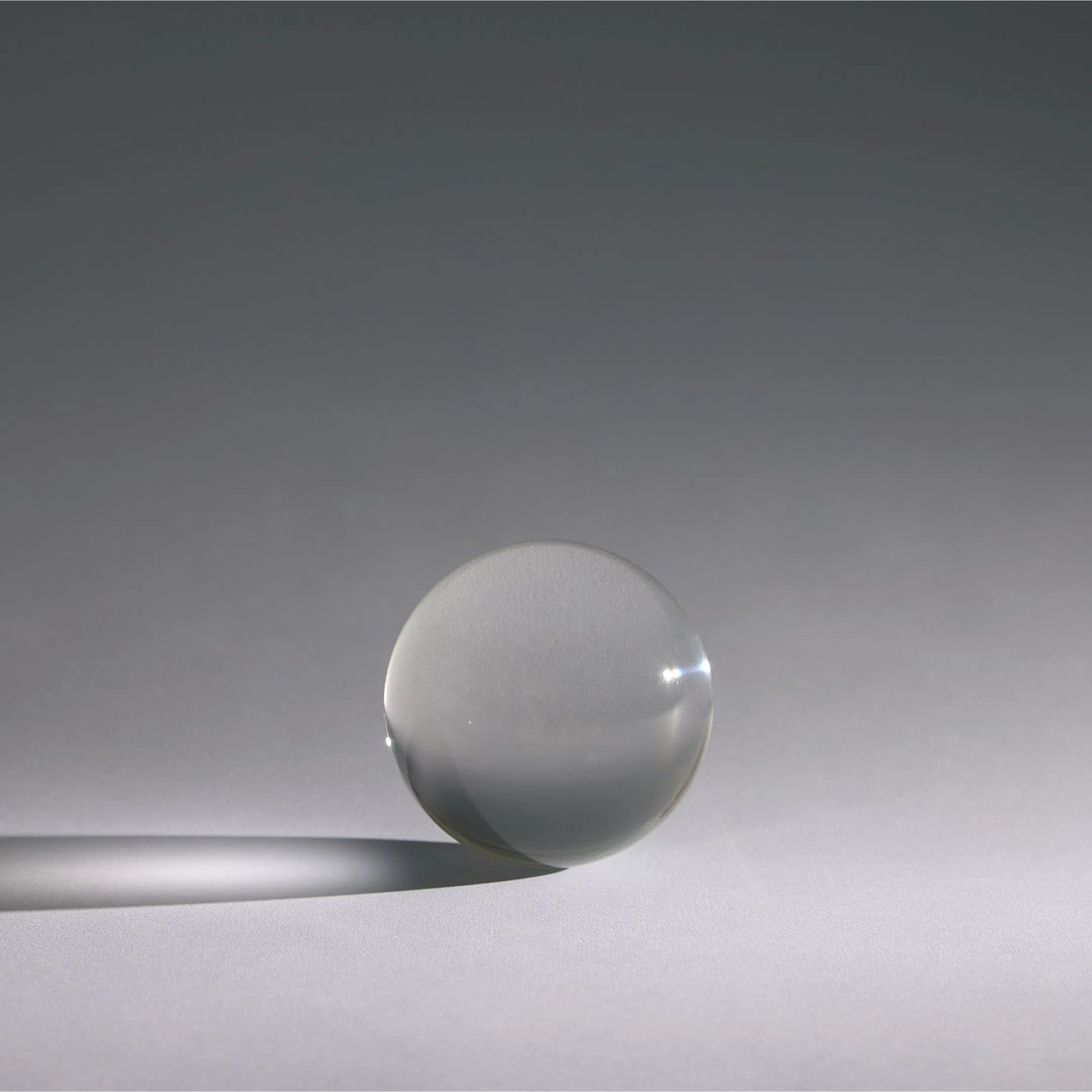 Crystal Sphere by Global Views in clear. Made from crystal in a modern style.