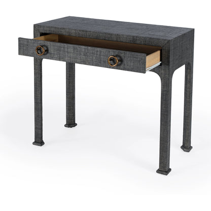 Chatham Raffia Console Table by Butler Specialty Company in charcoal and charcoal raffia. Made from gmelina beechwood solids, mdf panel with maple veneer, raffia, aluminium in a transitional style.