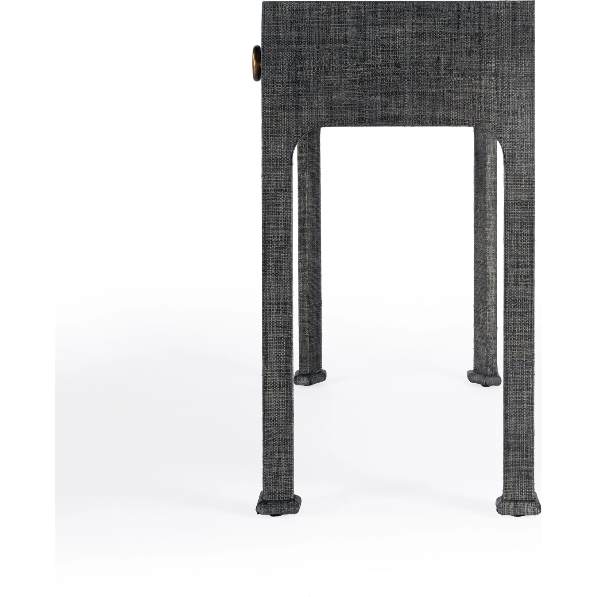 Chatham Raffia Console Table by Butler Specialty Company in charcoal and charcoal raffia. Made from gmelina beechwood solids, mdf panel with maple veneer, raffia, aluminium in a transitional style.