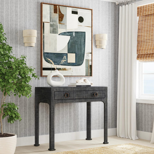 Chatham Raffia Console Table by Butler Specialty Company in charcoal and charcoal raffia. Made from gmelina beechwood solids, mdf panel with maple veneer, raffia, aluminium in a transitional style.
