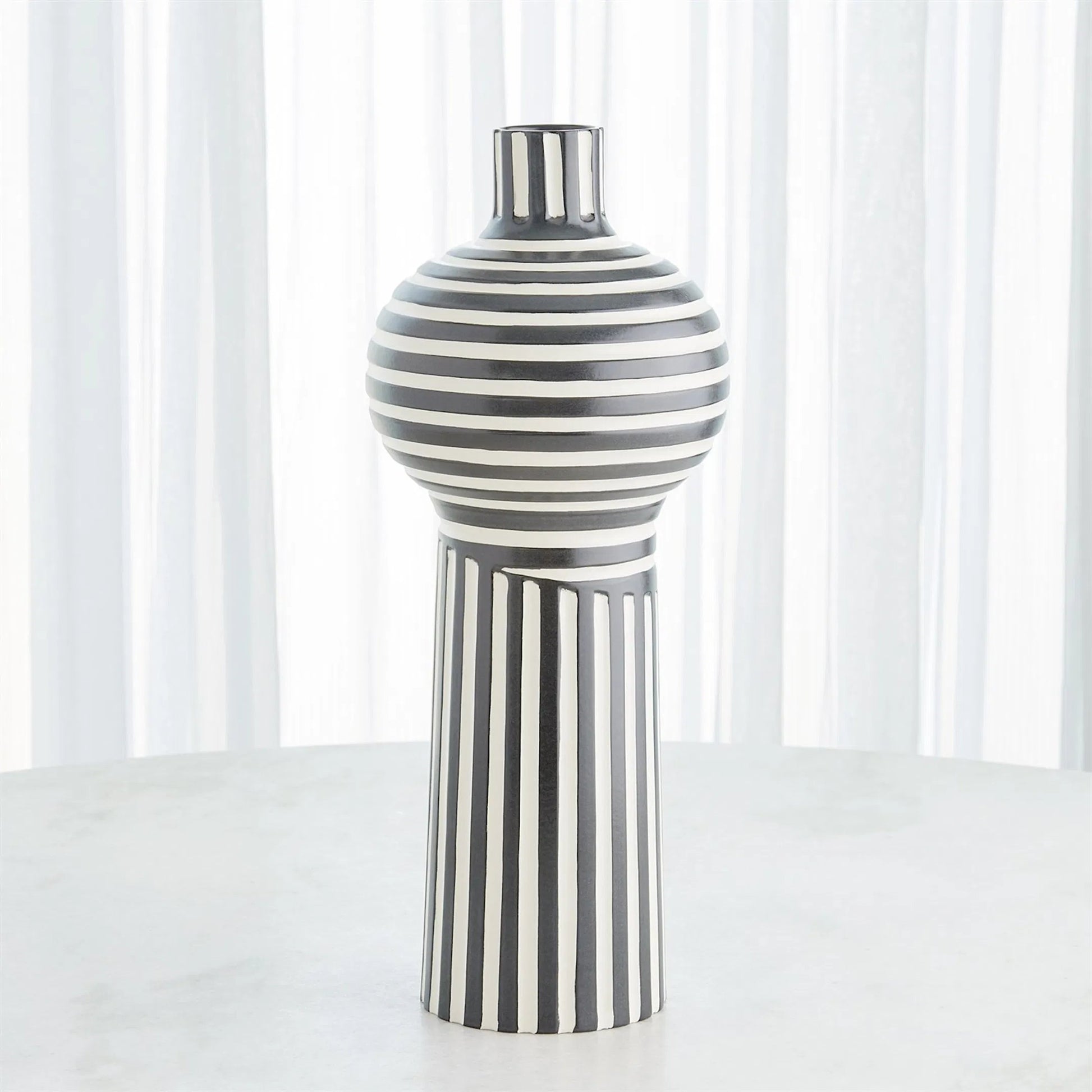 Colbert Vase by Global Views in white. Made from unique in a eclectic & global style.