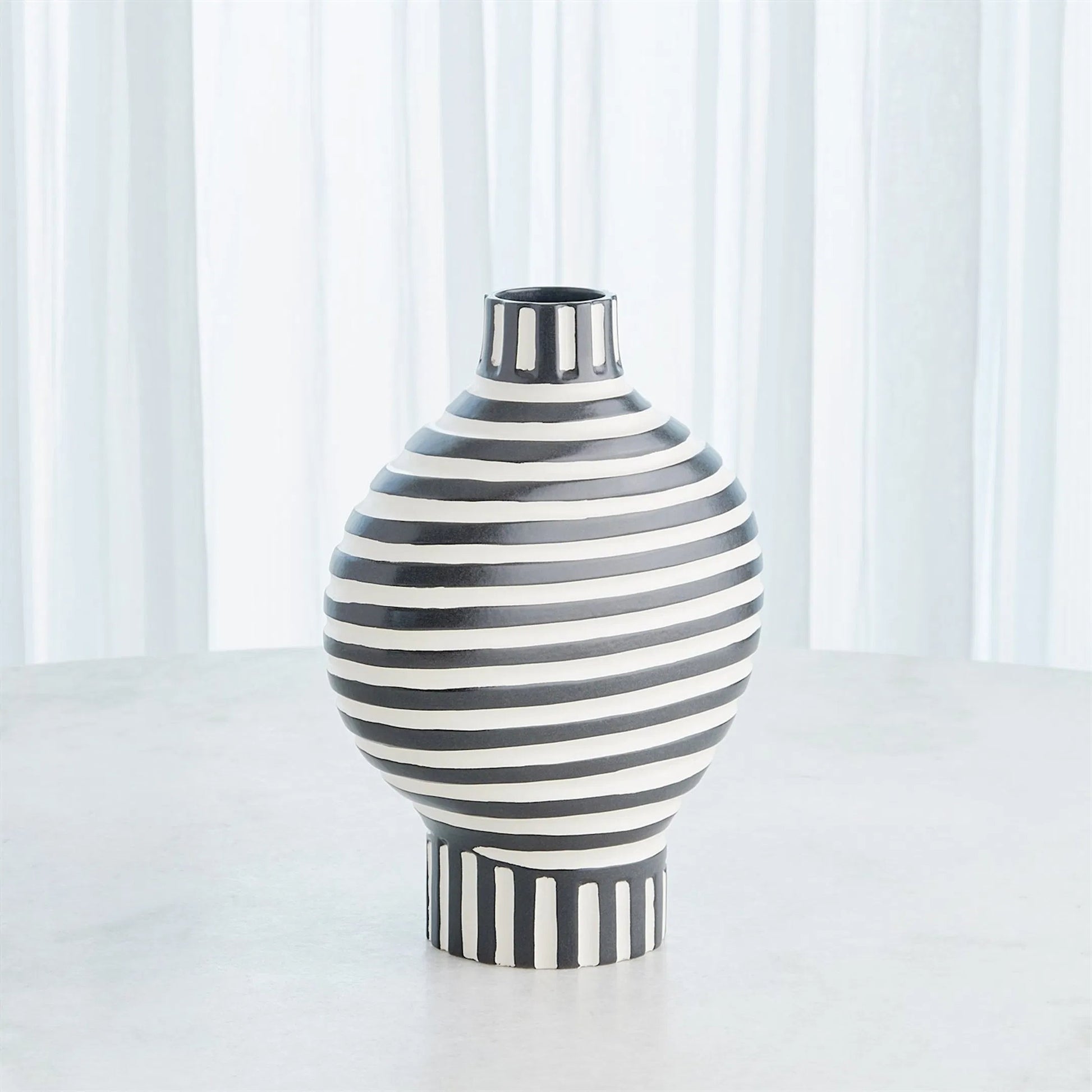 Colbert Vase by Global Views in white. Made from unique in a eclectic & global style.