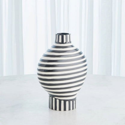 Colbert Vase by Global Views in white. Made from unique in a eclectic & global style.