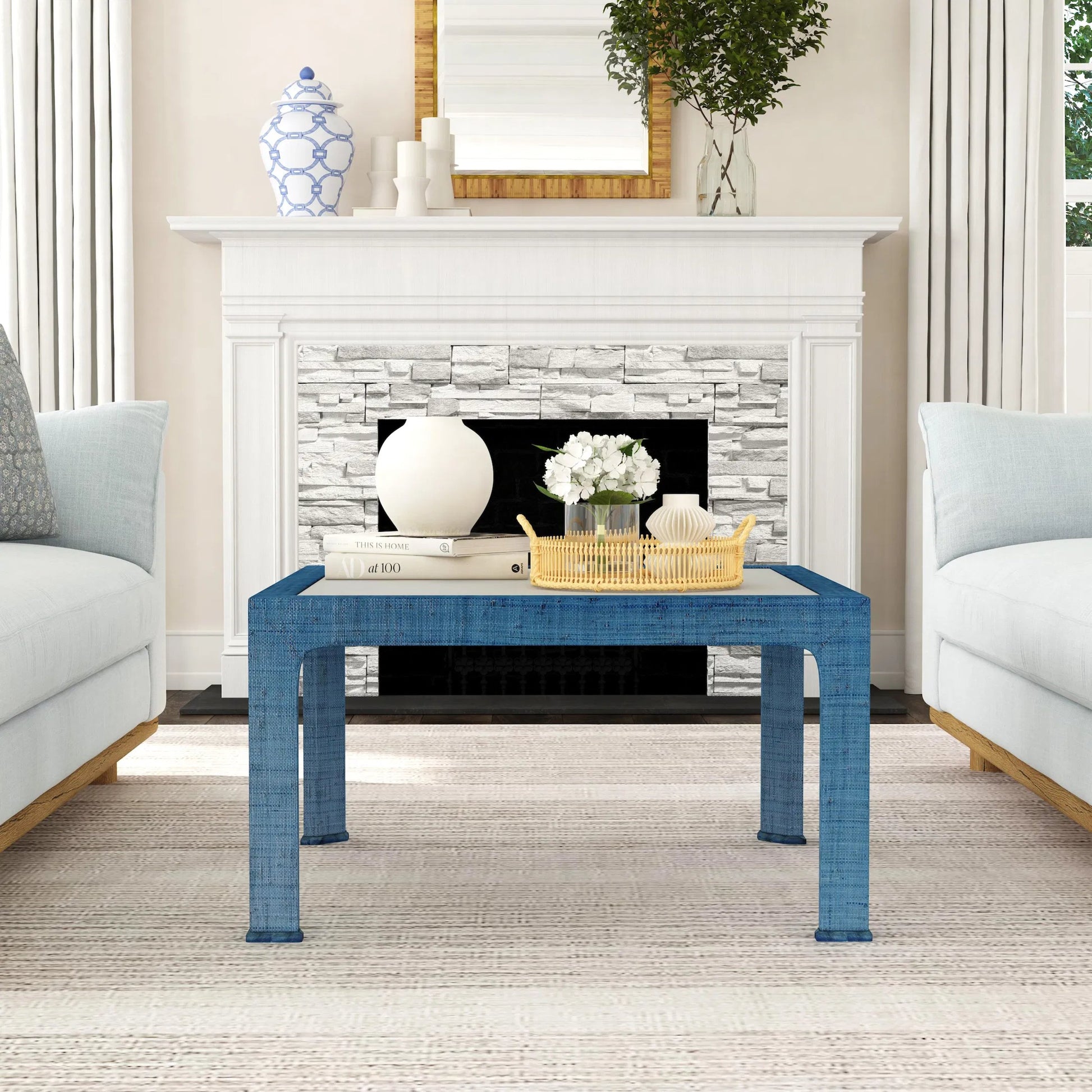 Chatham Raffia Coffee Table by Butler Specialty Company. Made from saguran raffia, glass, gmelina arborea wood in a unique style.
