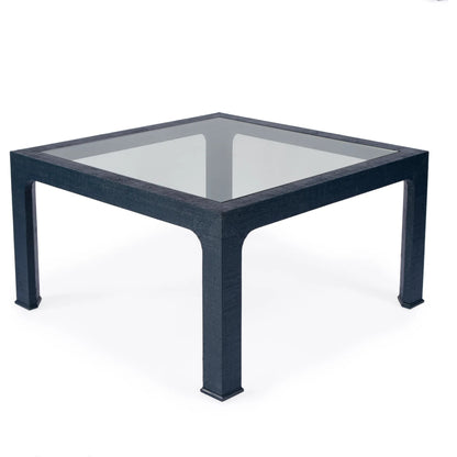 Chatham Raffia Coffee Table by Butler Specialty Company. Made from saguran raffia, glass, gmelina arborea wood in a unique style.