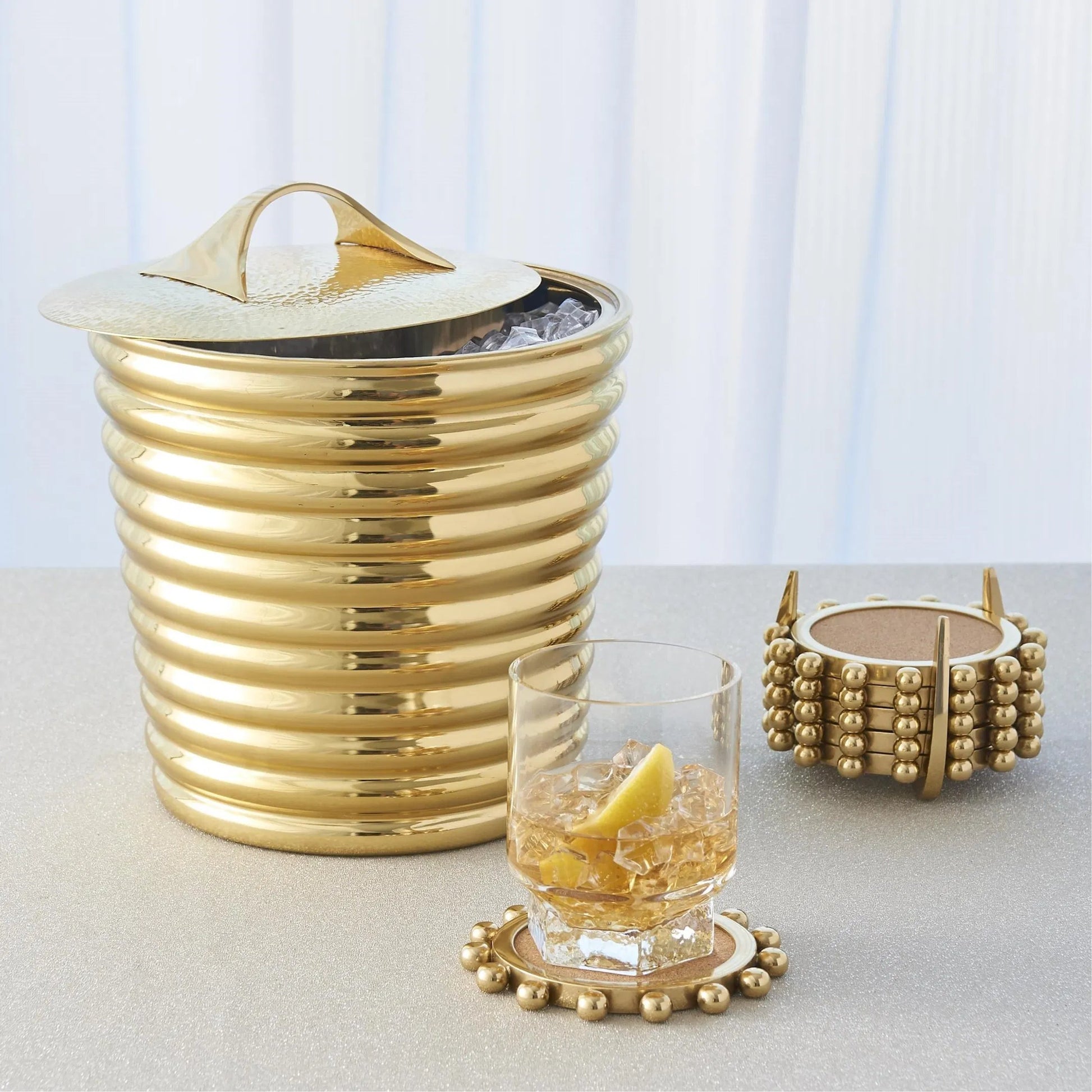 Beauty Ice Bucket by Global Views. Made from brass, stainless steel in a transitional style.