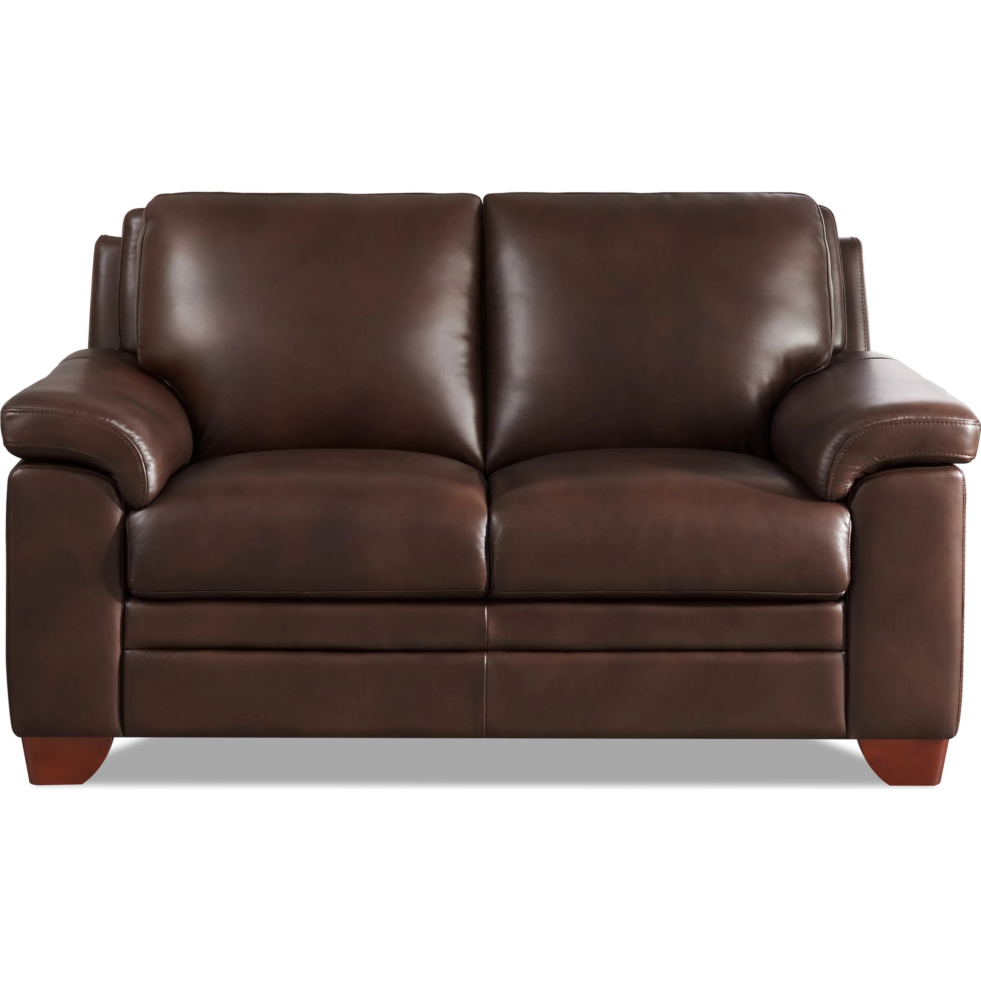Magnum Loveseat by Hydeline in chestnut brown. Made from leather in a traditional style.