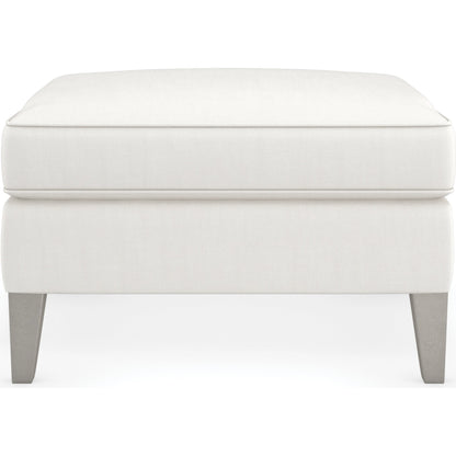 Victoria Ottoman by Caracole in cream and sparkling argent. Made from unique in a modern style.