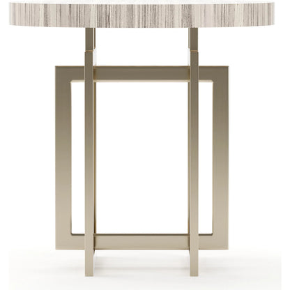 Wish You Were Here Round Side Table by Caracole in gold and whisper of gold. Made from stone in a modern style.