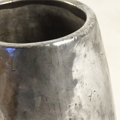 Distressed Metallic Vase by Zentique in distressed metallic silver. Made from stoneware in a transitional style.