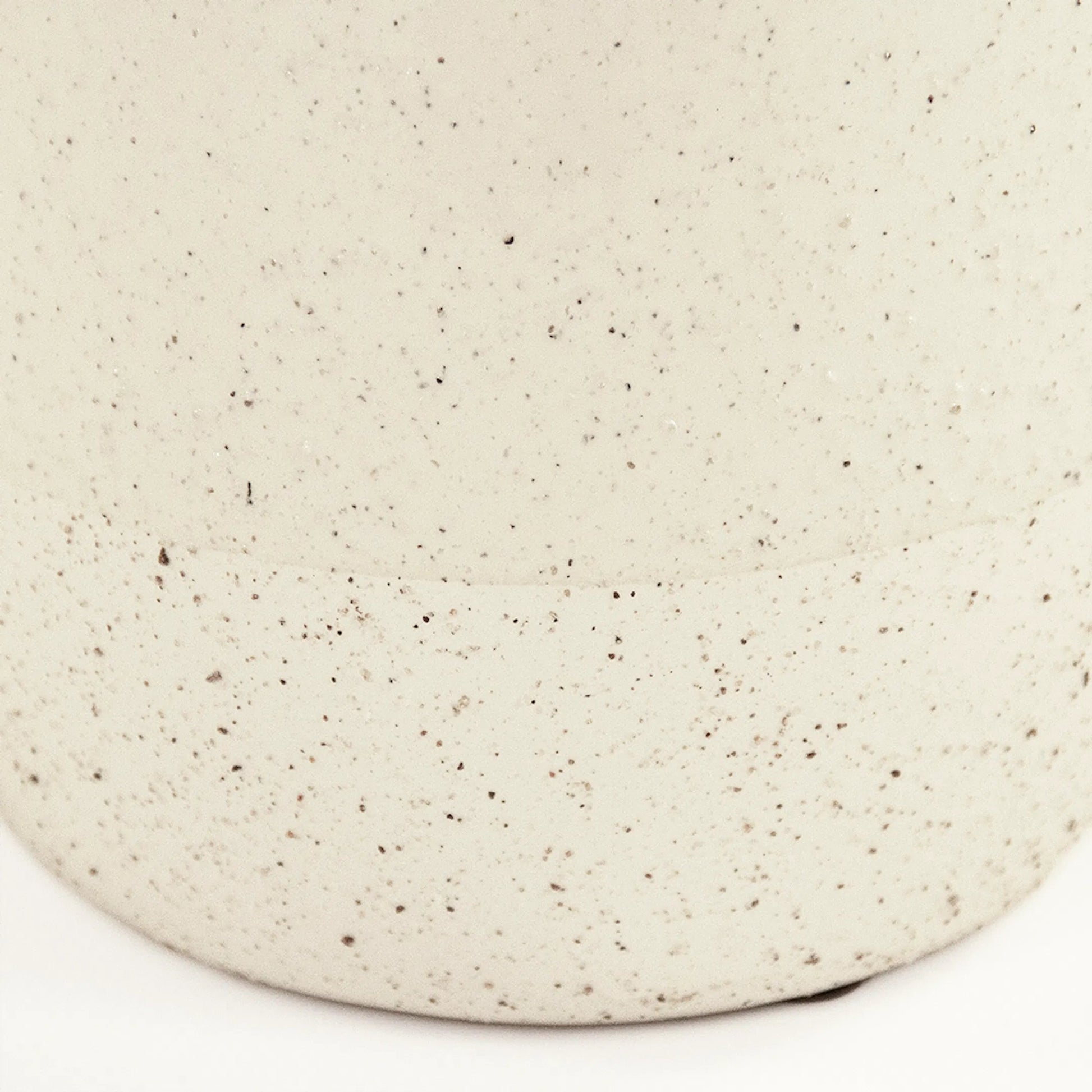 Vase by Zentique in partially glazed off-white. Made from ceramic in a unique style.