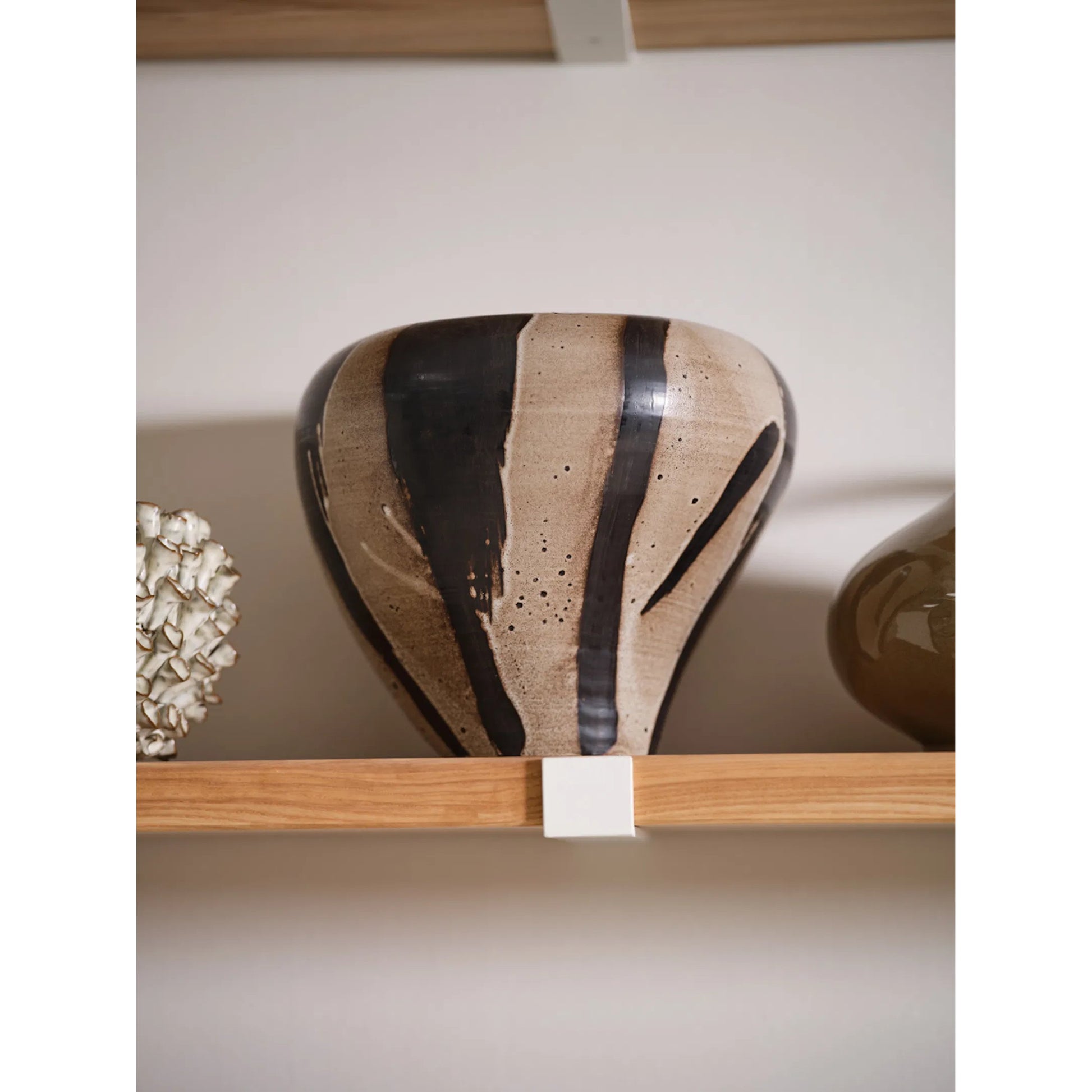 Atwood Vase by Accent Decor. Made from ceramic in a unique style.
