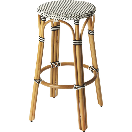Tobias Wood Bar Stool by Butler Specialty Company. Made from rattan, polyurethane synthetic rattan in a coastal style.