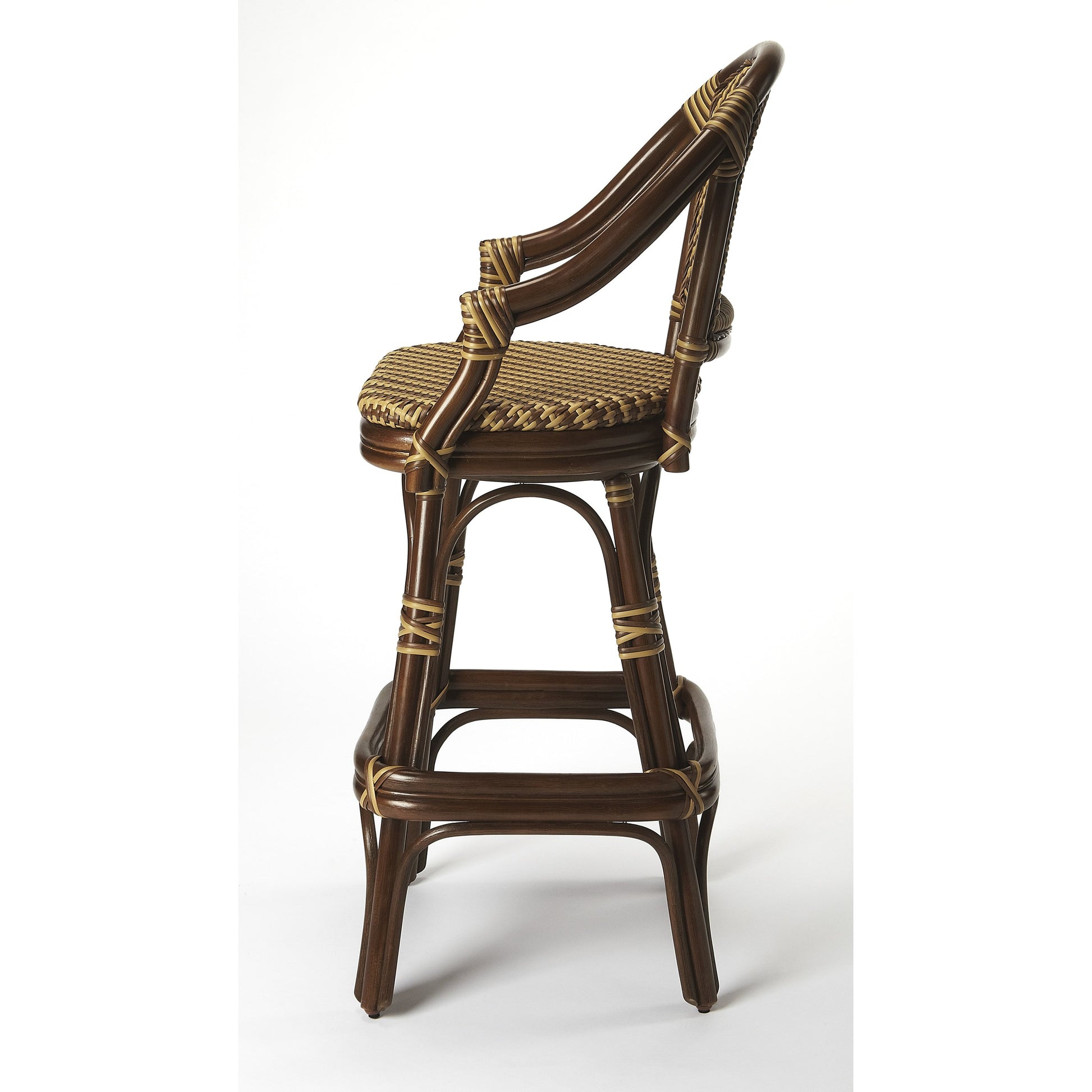 Renata Rattan Bar Stool by Butler Specialty Company in multi-color and designer's edge. Made from rattan, raffia, plastic in a coastal style.