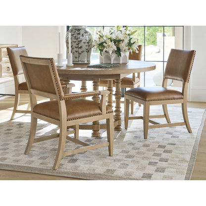 Colburn Leather Upholstered Arm Chair by Barclay Butera in tan. Made from white oak, leather in a unique style.