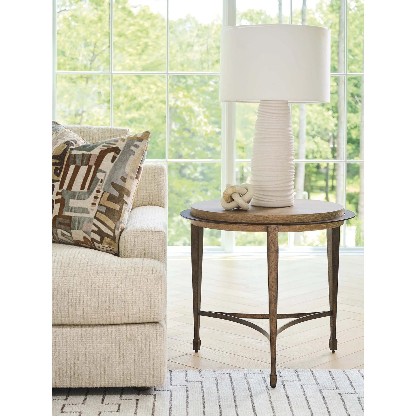 002 SI-2540478 | Lifestyle | Catalonia Round Side Table by Barclay Butera in tan. Made from white oak, metal in a unique style.