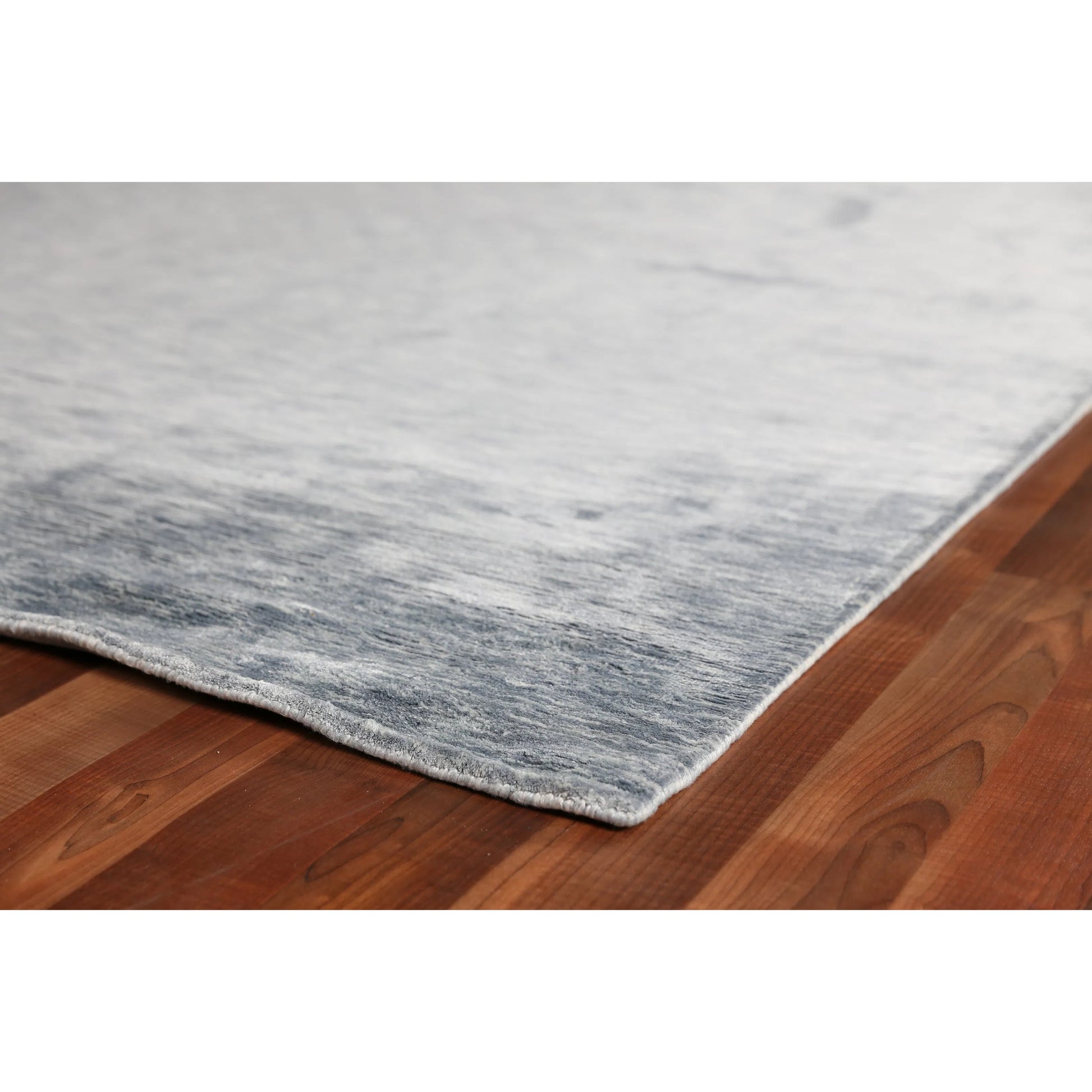 Dove Rug by Exquisite Rugs. Made from viscose in a unique style.