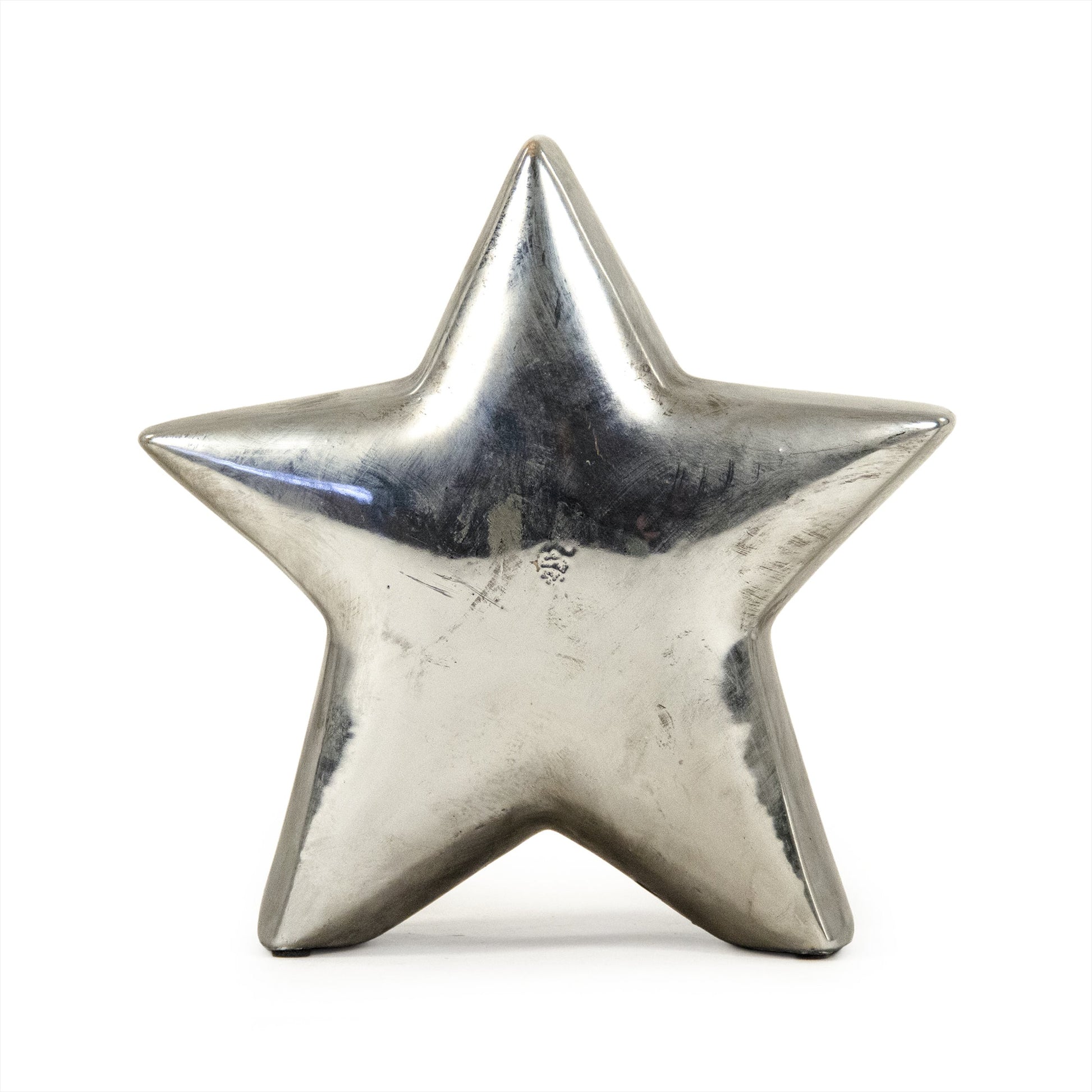 Distressed Metallic Star by Zentique in distressed metallic silver and stoneware. Made from stoneware in a modern style.