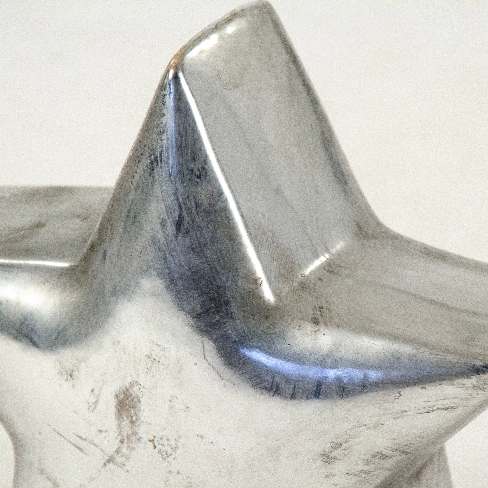 Distressed Metallic Star by Zentique in distressed metallic silver and stoneware. Made from stoneware in a modern style.