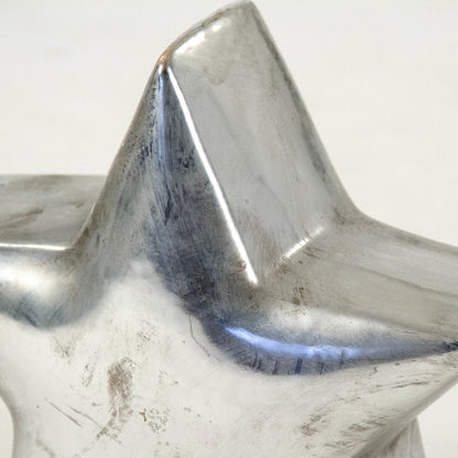 Distressed Metallic Star by Zentique in distressed metallic silver and stoneware. Made from stoneware in a modern style.
