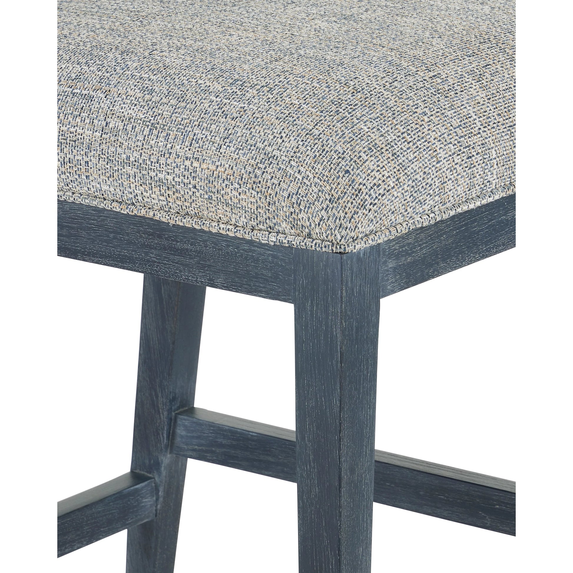 Santos Counter Stool by Currey and Company. Made from mahogany, rattan, brass in a modern style.