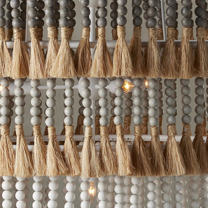 St. Barts Chandelier by Currey and Company in mist blue, demin blue. Made from wrought iron, wood beads, abaca rope in a coastal style.