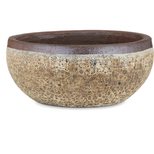 Lyra Beige Planter by Currey and Company in reactive cream. Made from ceramic in a modern style.