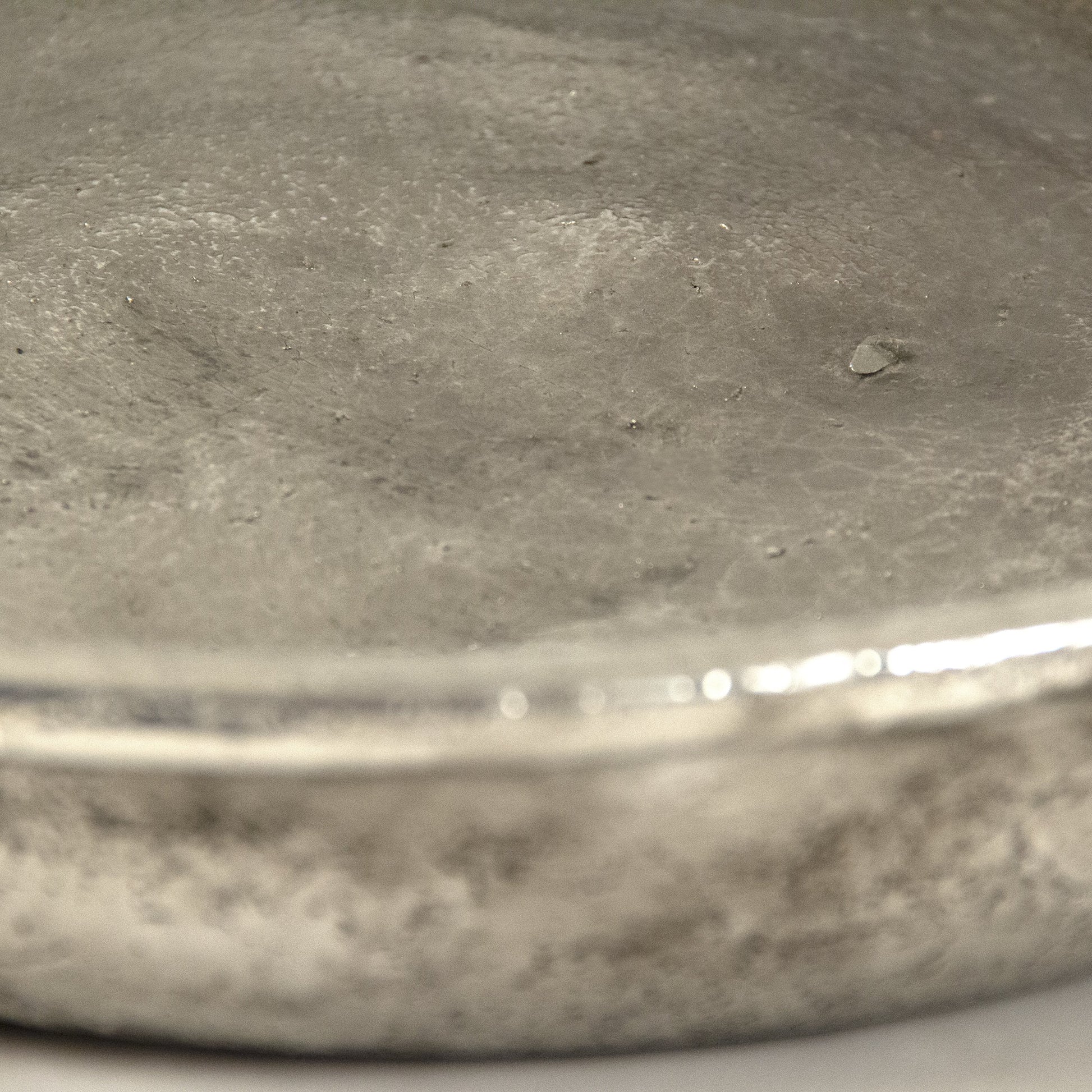 Distressed Metallic Plate by Zentique in distressed metallic silver and stoneware. Made from stoneware in a transitional style.