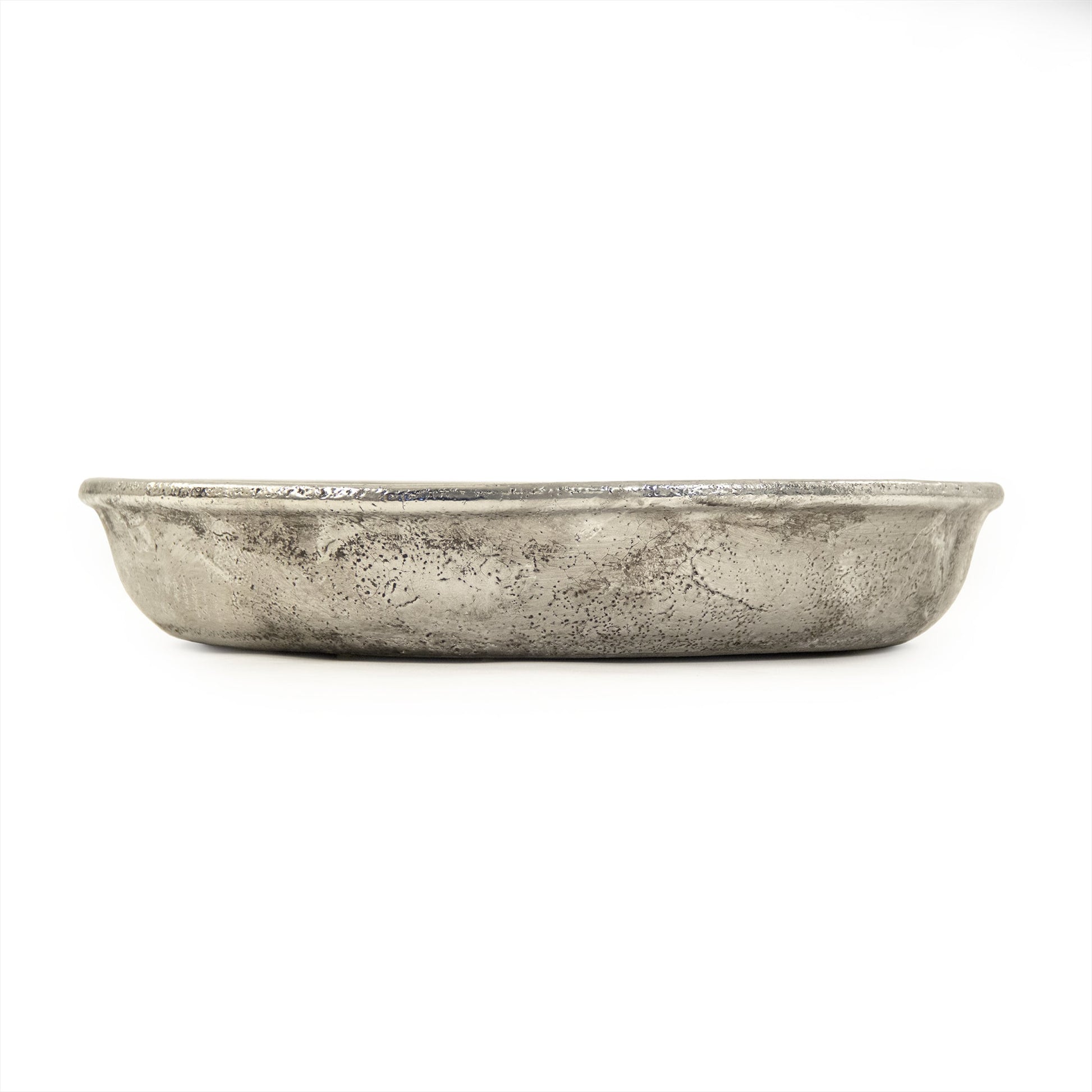 Distressed Metallic Plate by Zentique in distressed metallic silver and stoneware. Made from stoneware in a transitional style.