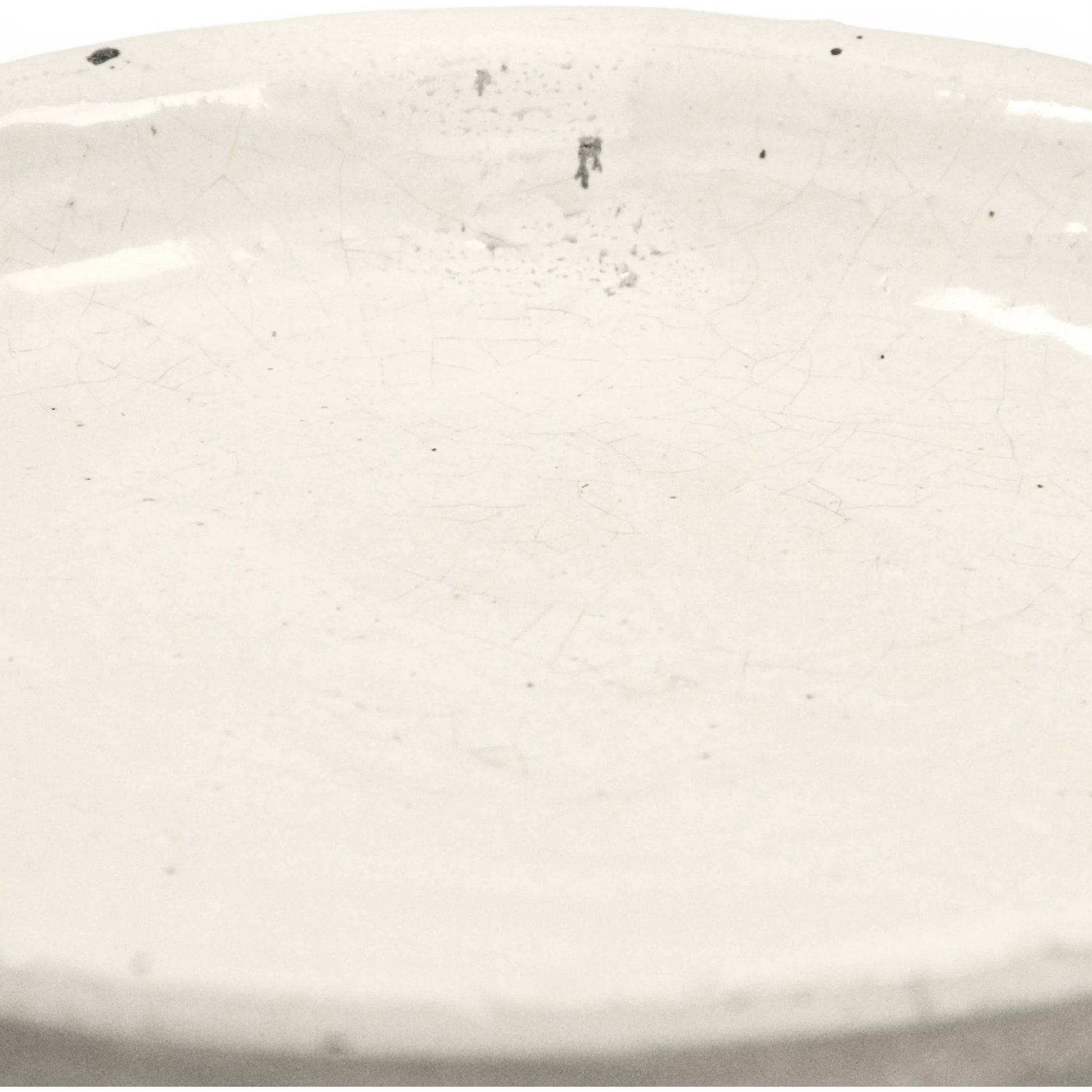 Distressed White Plate by Zentique in distressed white. Made from stoneware in a rustic style.