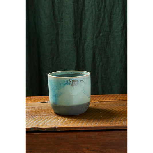 Caribe Pot by Accent Decor in green. Made from ceramic in a unique style.