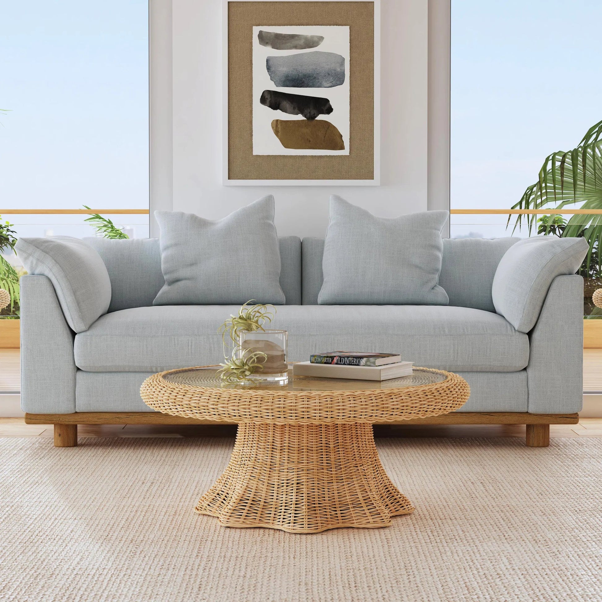 Flora Scalloped Coffee Table by Butler Specialty Company in light brown. Made from rattan, mahogany, plywood, glass in a rustic style.