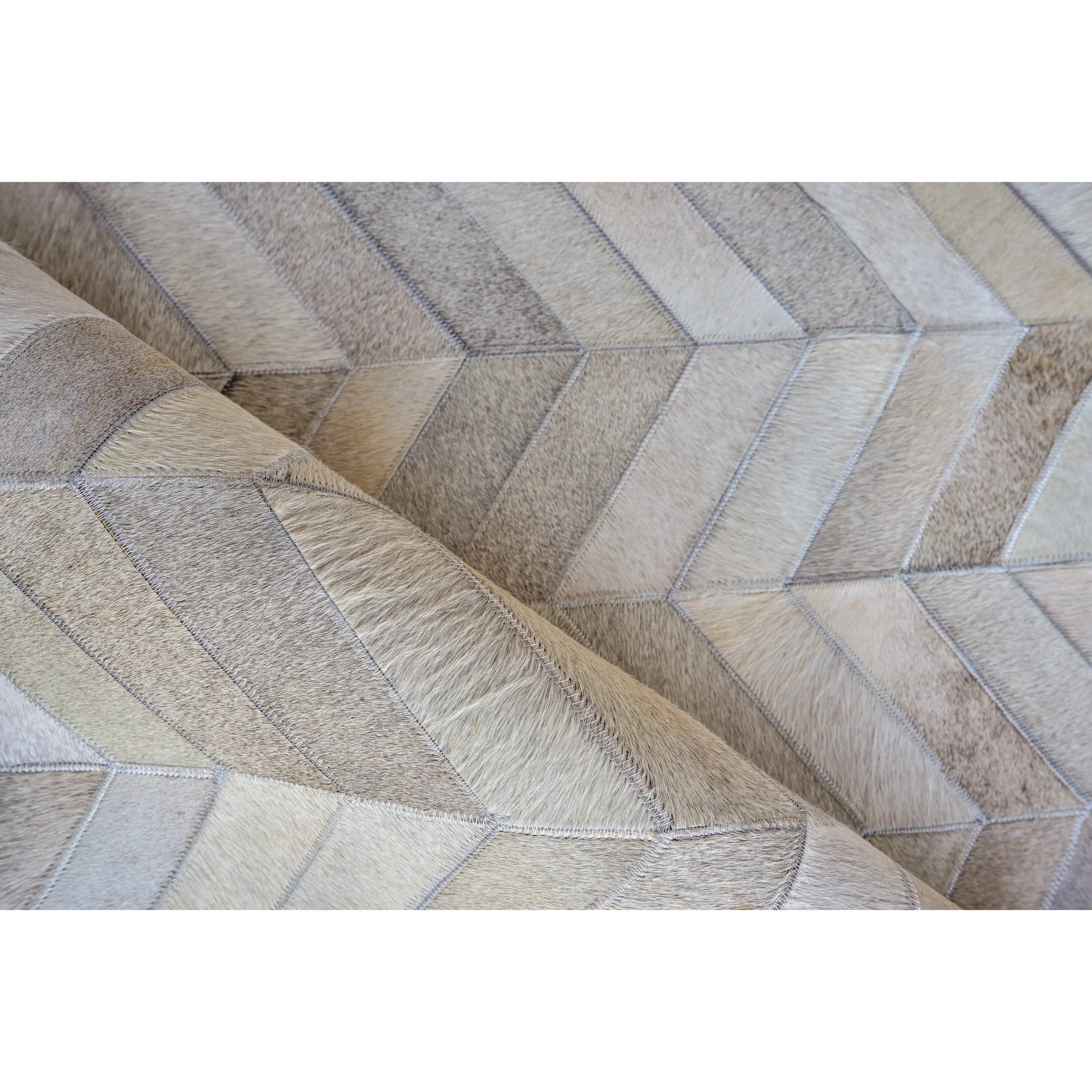 Natural Hide Rug by Exquisite Rugs. Made from leather hide in a unique style.