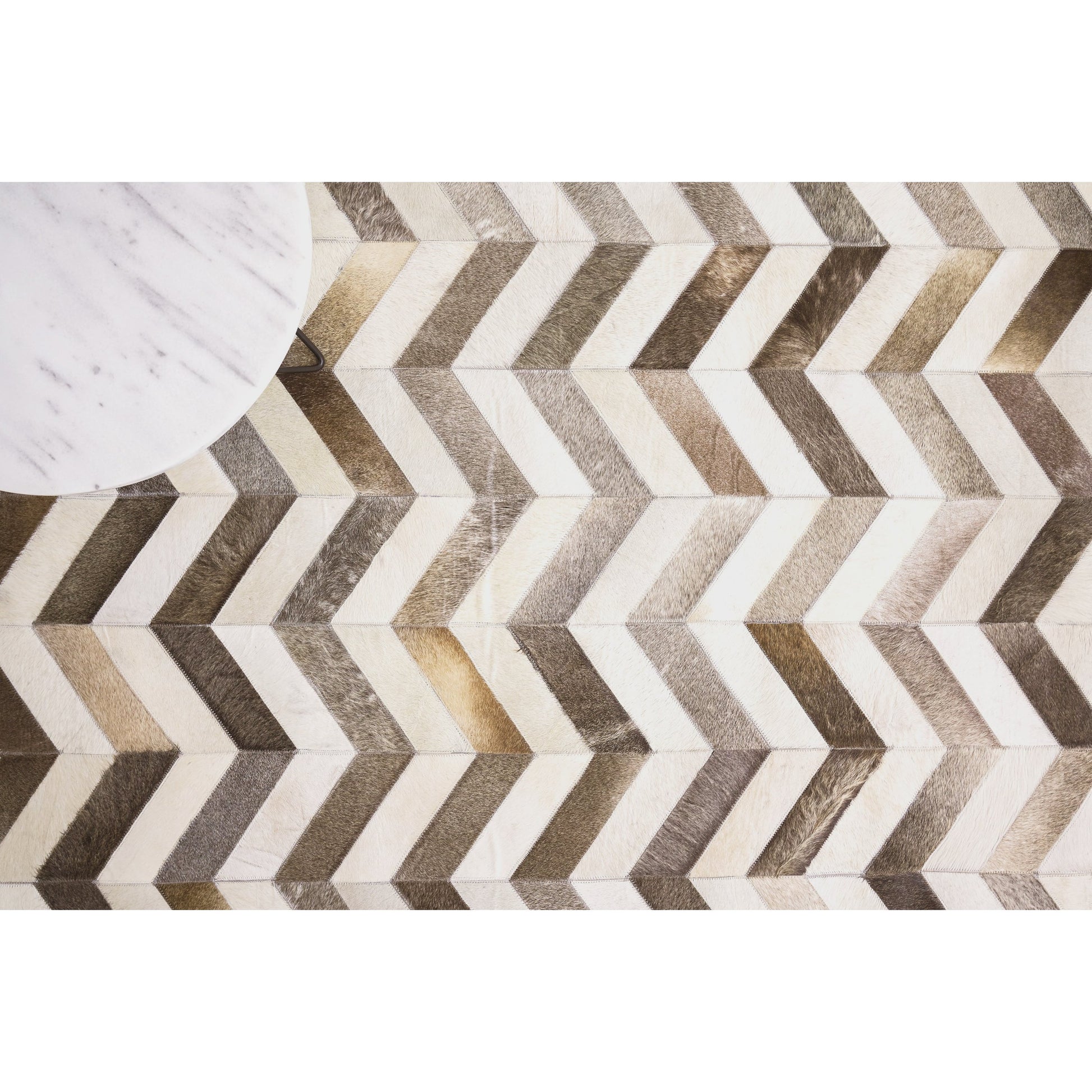 Natural Hide Rug by Exquisite Rugs. Made from leather hide in a unique style.