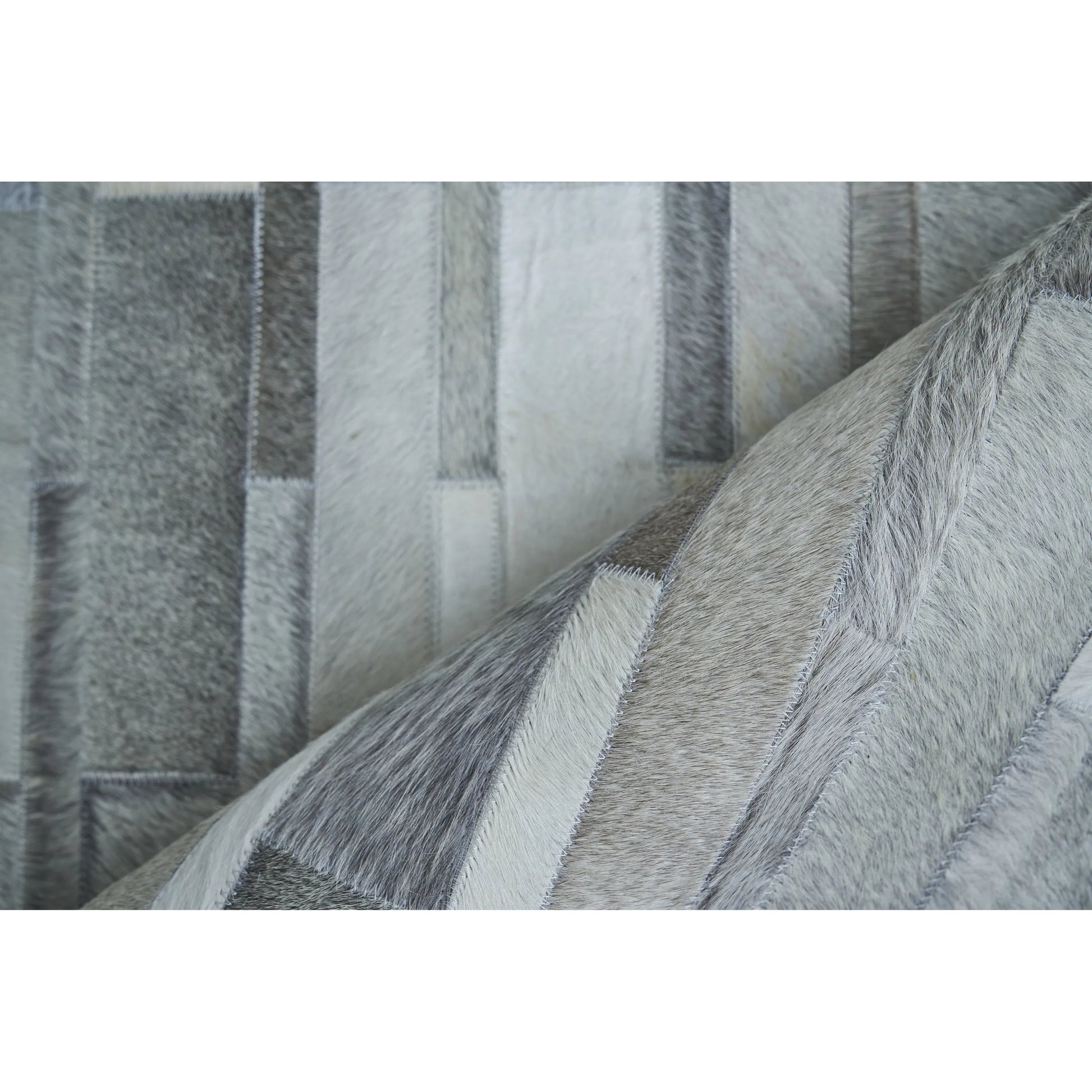Natural Hide Rug by Exquisite Rugs in gray. Made from leather hide in a unique style.