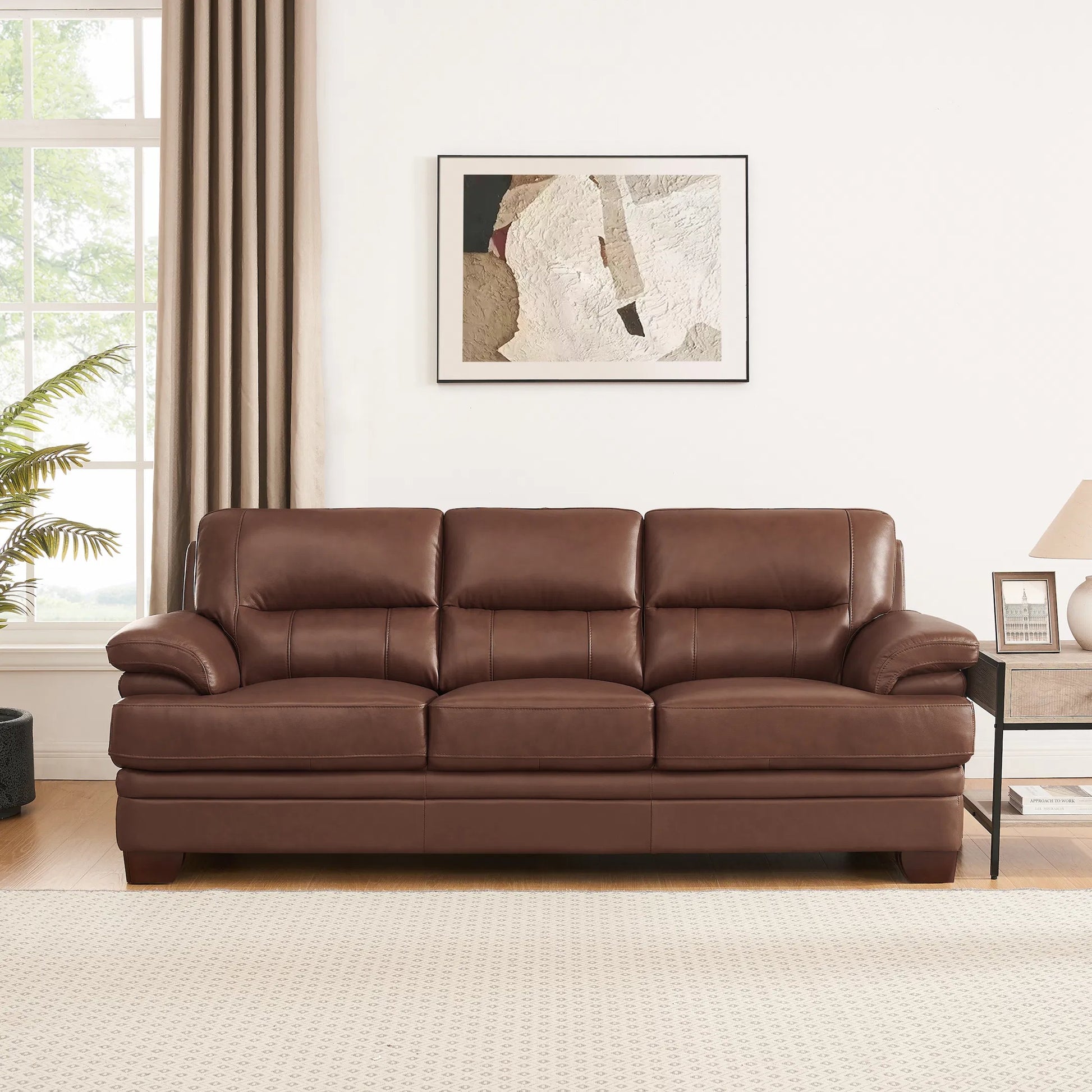 Luxor Sofa by Hydeline in black. Made from leather in a traditional style.