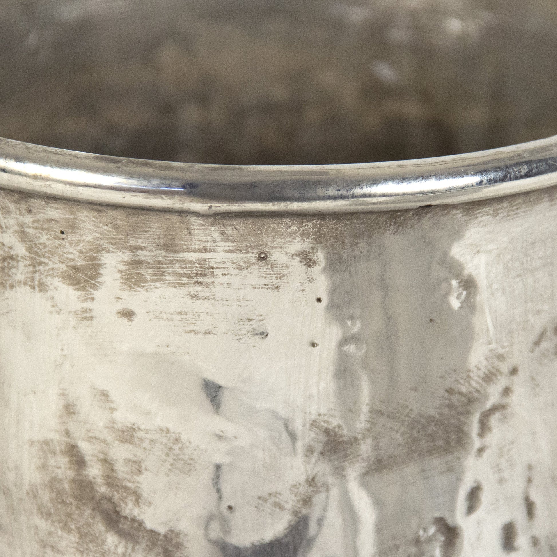 Distressed Metallic Pitcher by Zentique in distressed metallic silver and stoneware. Made from stoneware in a traditional style.