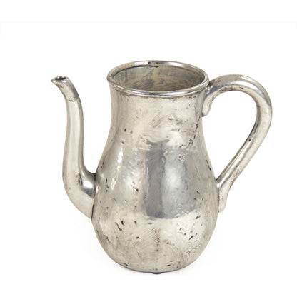 Distressed Metallic Pitcher by Zentique in distressed metallic silver and stoneware. Made from stoneware in a traditional style.