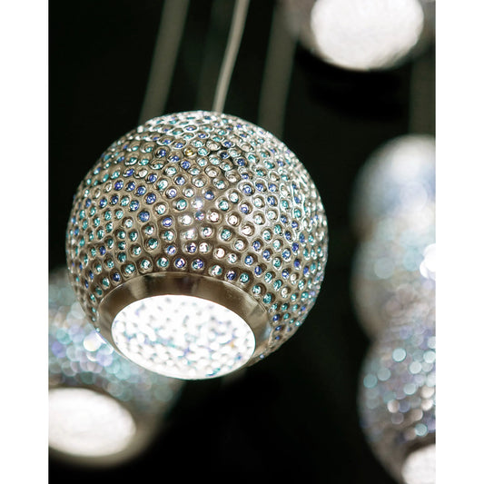 Giro Linear Pendant by Currey and Company in painted silver, nickel, blue. Made from metal, glass bead in a modern style.