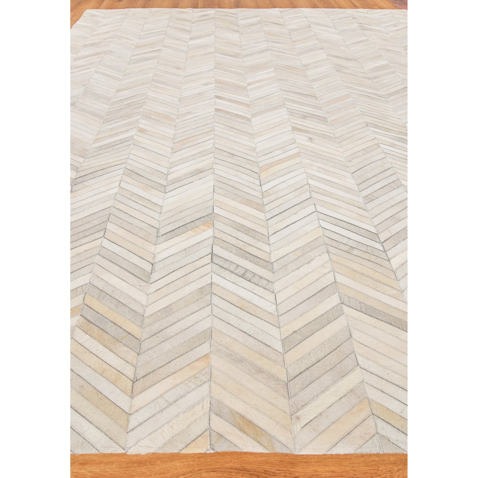 Natural Hide 9904 Rug by Exquisite Rugs in silver. Made from leather hide in a unique style.