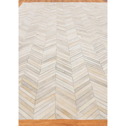 Natural Hide 9904 Rug by Exquisite Rugs in silver. Made from leather hide in a unique style.
