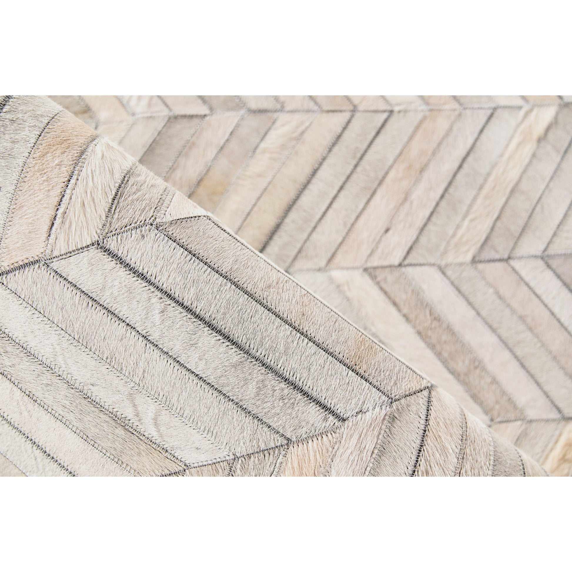 Natural Hide 9904 Rug by Exquisite Rugs in silver. Made from leather hide in a unique style.
